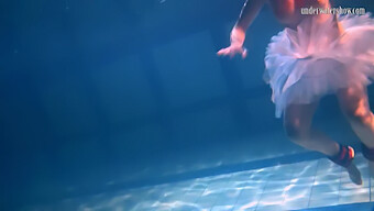 Bikini-Clad Bulava Lozhkova In A Red Tie And Skirt, Posing Underwater