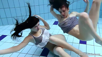 Czech Naturist Aneta And Russian Beauty Janka Swim Without Swimsuits In A Pool